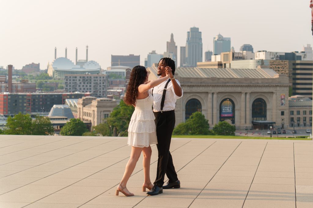 couple dancing with skyline behind, kc skyline